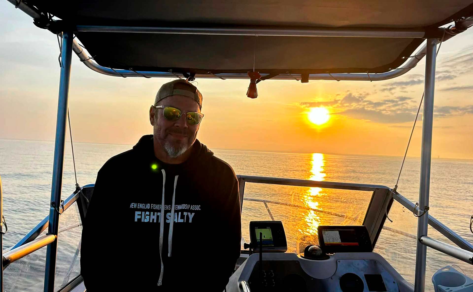 Adirondack-Seafood-Mike-On-Boat